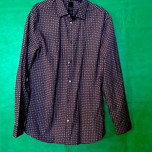 Long sleeve shirt! Burgundy with white designs on it